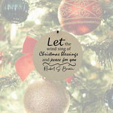 Christmas wind chime ornament with the text "Let the wind sing of Christmas blessings and peace for you," personalized with your name